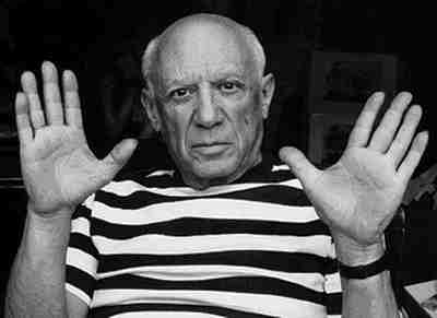 Pablo Picasso showing his hands
